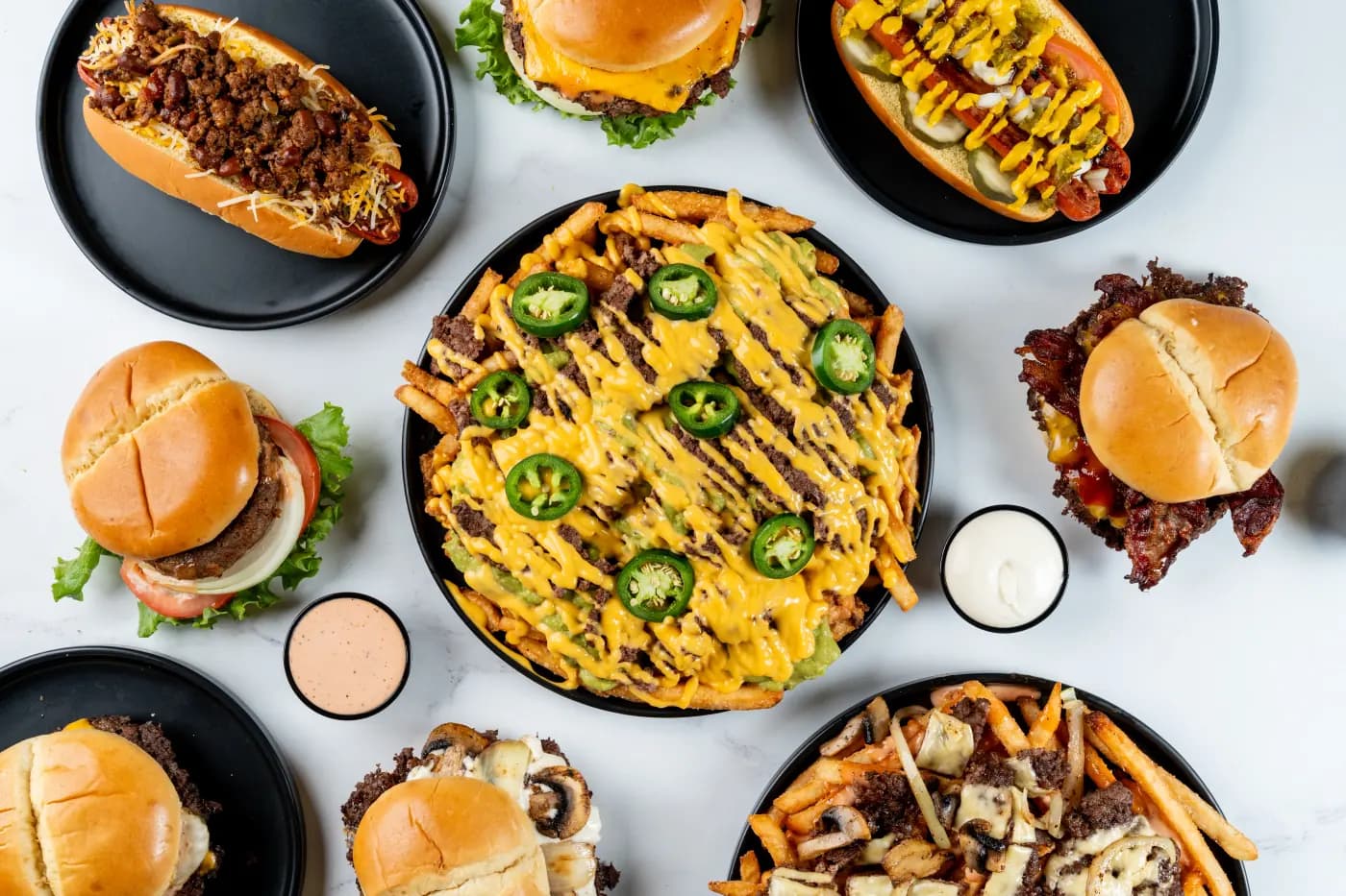 A Juicy Joint halal Wagyu smash burger with melted cheese and signature sauce